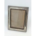 A silver photograph frame,
