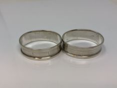 A pair of oval silver napkin rings,