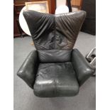 A late twentieth century high backed black leather adjustable chair on swivel base