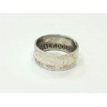 An American half dollar 1963 ring,