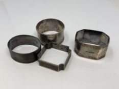Four assorted silver napkin rings CONDITION REPORT: 73.