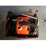 A Henry vacuum with tools