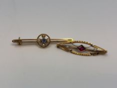 A gold sapphire and diamond brooch and a gold garnet and pearl brooch