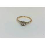 An 18ct gold solitaire diamond ring, approximately 0.