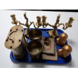 A tray of eight day anniversary clock, Indian brass goblets, pair of brass two way candelabrum,