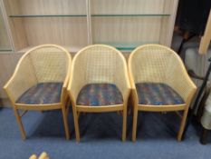 A set of six contemporary bergere backed tub chairs