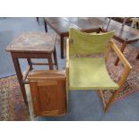 A pine single door cabinet together with a pine framed armchair and stool