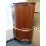 A mid century Danish teak double corner cabinet