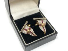 A fine pair of 18ct gold ruby and diamond Royal Yachting Squadron earrings CONDITION