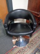 A gas lift barber's chair