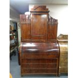 A late nineteenth century mahogany cylinder bureau bookcase