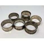 Six assorted silver napkin rings CONDITION REPORT: 73.