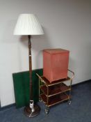 A gilt three tier tea trolley together with standard lamp with shade and loom box