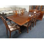 An eight piece mahogany Regency style dining room suite comprising of four drawer cabinet,