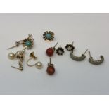 Six pairs of gold earrings; pearl, coral,