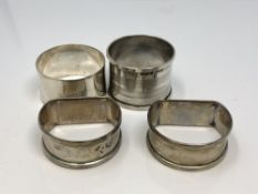 Four assorted silver napkin rings CONDITION REPORT: 74.