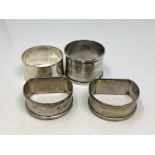 Four assorted silver napkin rings CONDITION REPORT: 74.