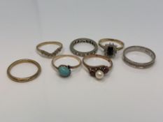 Seven gold gem set rings including ruby, diamond, turquoise etc CONDITION REPORT: 12.