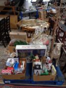 A pallet of Christmas decorations, wreaths, animated winter village,