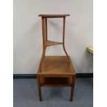 An Eastern triangular table together with two tier oak table