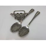 A pair of Victorian silver jam spoons and an ornate silver menu stand (3)