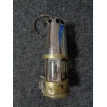 A brass and chrome vintage miner's lamp