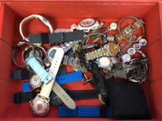 A box of replica and costume lady's and gent's wristwatches