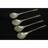 Three late twentieth century 'Christmas' spoons issued by the Franklin mint together with a