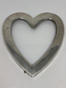 A silver heart shaped photo frame, Chester 1901 CONDITION REPORT: Frame only,