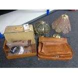 A cased Singer electric sewing machine together with a box of constellation luggage case,