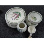 Twenty six pieces of Portmeirion china, decorated with the botanical pattern as is normal,