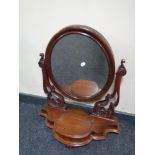 A Victorian mahogany dressing table mirror