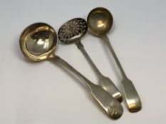 Two silver Georgian ladles and a Victorian strainer (3) CONDITION REPORT: 132g