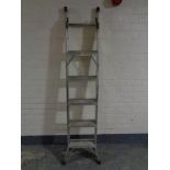 An aluminium three way ladder