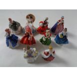 Ten miniature Royal Doulton lady figures.