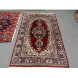 A Tabriz design rug