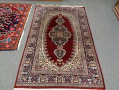 A Tabriz design rug