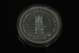 A Canadian silver commemorative dollar 1952 - 1977.