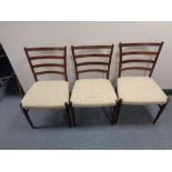 A set of six mid century Danish ladder backed dining chairs