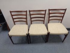A set of six mid century Danish ladder backed dining chairs