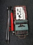 A box of telescope with accessories on stand,