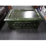 A green buttoned leather Chesterfield ottoman footstool