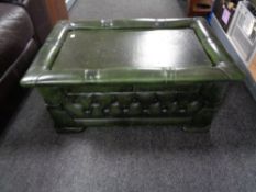 A green buttoned leather Chesterfield ottoman footstool