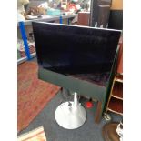 A Bang and Olufsen Beovision 6-26 TV on raised stand (continental wiring)
