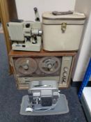 A cased Sanyo reel to reel stereo system and two vintage cased projectors