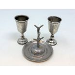 A pair of Edwardian silver goblets and an antique silver ring tree (3) CONDITION REPORT: