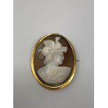 An antique gold cameo brooch