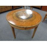 A late 19th century French circular walnut, satinwood and floral marquetry occasional table,