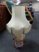 A Chinese glazed pottery table lamp with shade