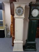 An early twentieth century painted continental longcase clock with circular silvered dial,